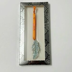 Taylor swift the life of a showgirl feather ornament